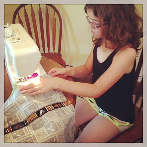 Photo: 4H Fair judging starts in 2 days! Taking the day off to get the last minute touches on a few projects. Today, it is finished her sewing non-wearable. A Purdue pillow!